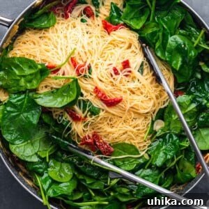 Sun-Drenched Spinach and Tomato Pasta 9 Spinach sun dried tomato pasta featured image.