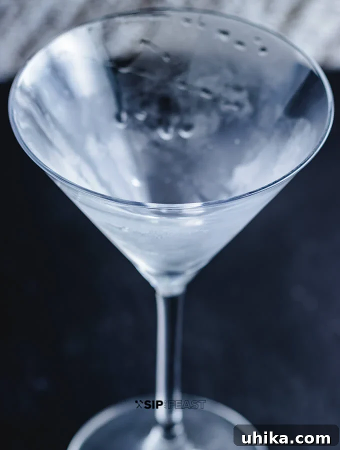 Blue Cheese Olive Martini - sipandfeast.com #martini #cocktails #bluecheese #olives A sparkling clean, frosted martini glass, now emptied of its chilling ice, perfectly prepared and ready to receive a freshly mixed cocktail.