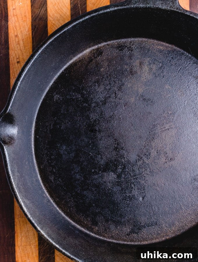 Reverse Seared Ribeye Steaks - sipandfeast.com #reversesear #ribeye #steak #dinner A 12" cast iron pan