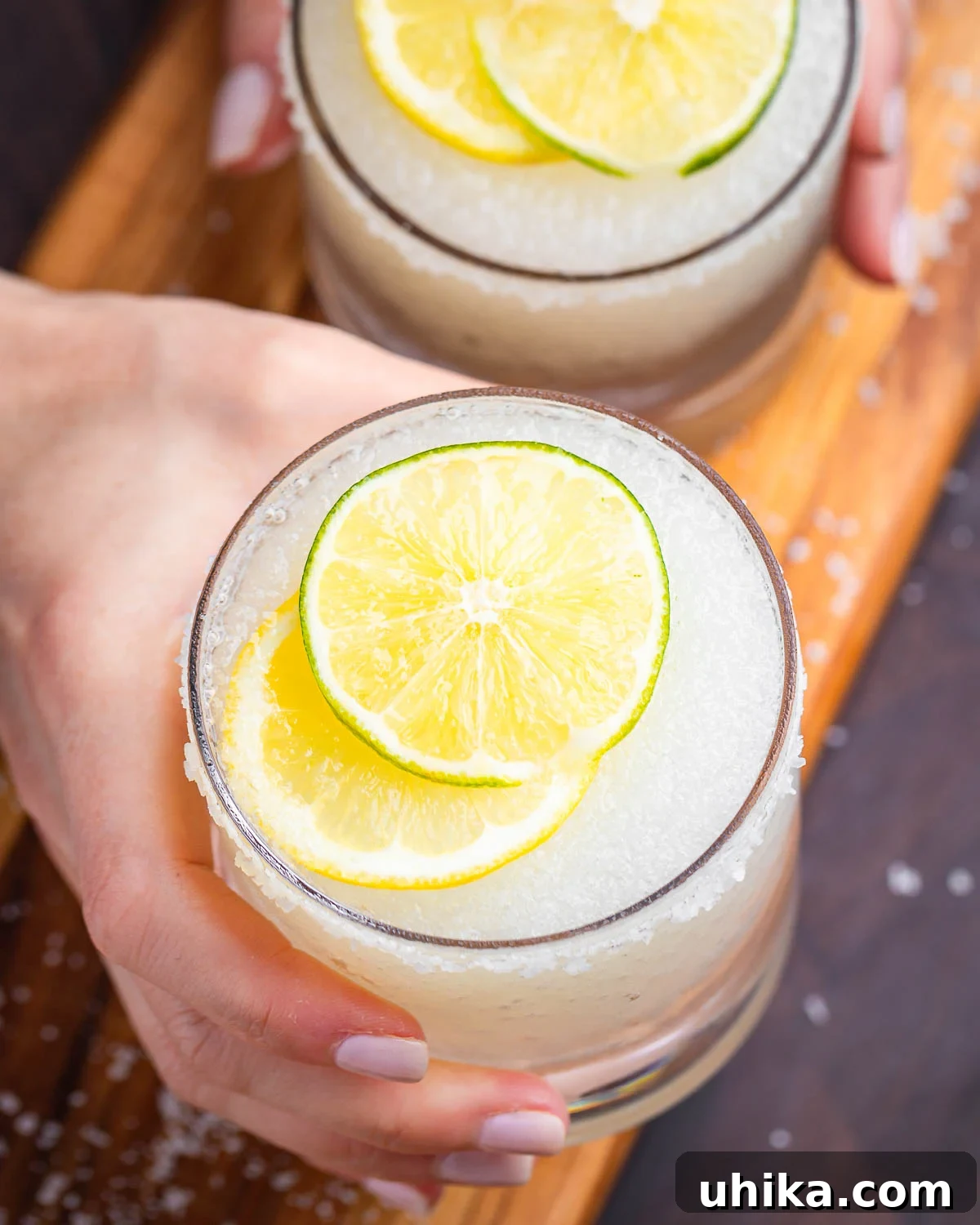 The Amalfi Coast Margarita 2 Limoncello margarita held in hands.