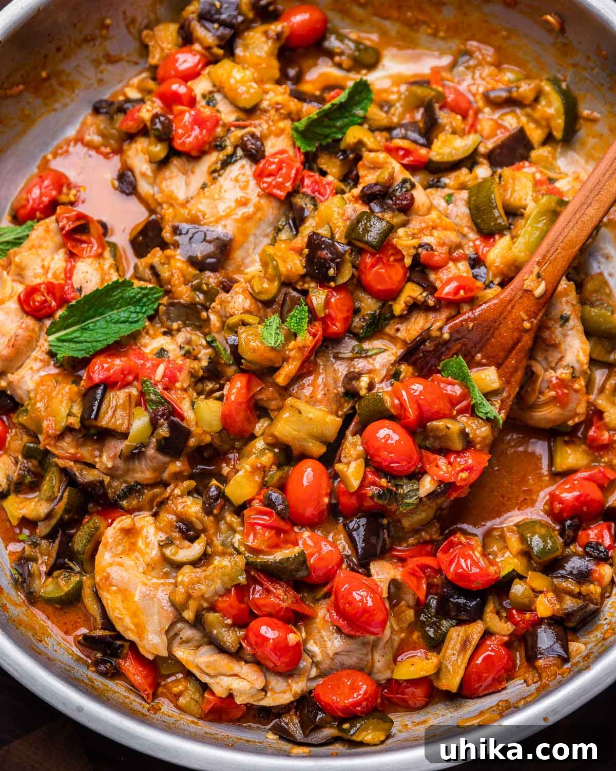 Sicilian Agrodolce Chicken 7 Chicken Agrodolce simmering in a large pan, ready to be served.