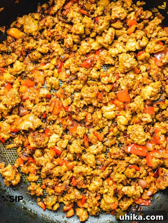 Chorizo and Eggs - sipandfeast.com #breakfastrecipes #eggrecipes #brunch #chorizo Sauteed chorizo, peppers, and onions for the chorizo and eggs.
