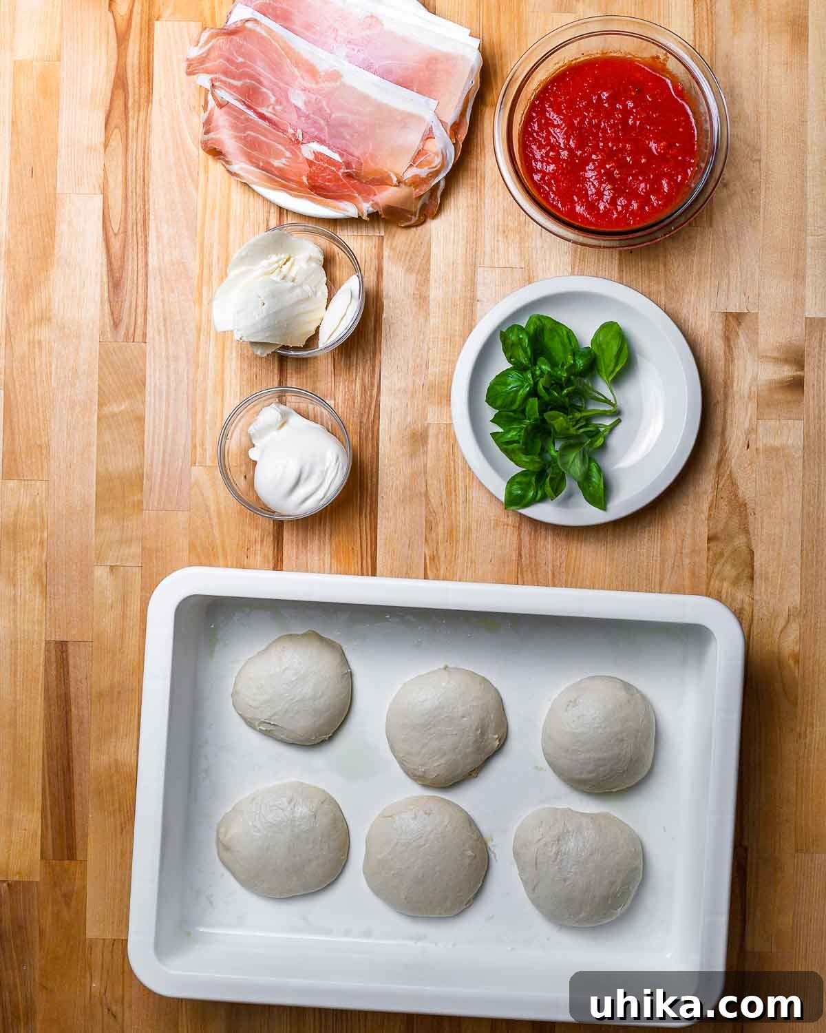 Golden Fried Pizza 3 Ingredients shown: prosciutto, tomato sauce, mozzarella, burrata, basil, and 6 small dough balls.