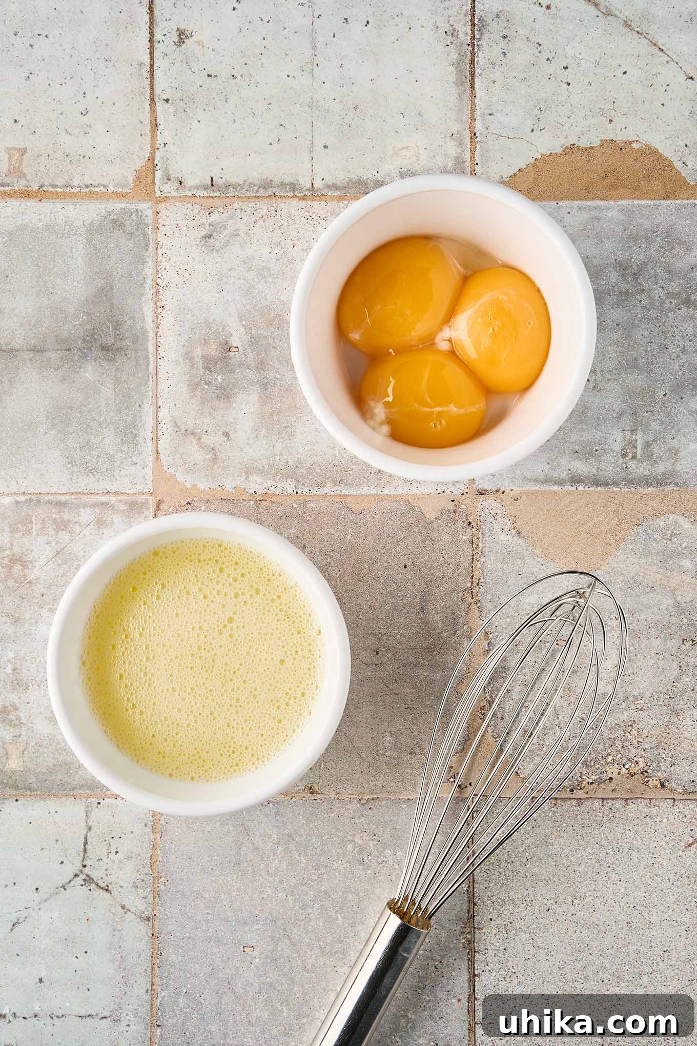 Golden Greek Avgolemono Soup 4 Frothy, perfectly whisked egg whites, prepared and ready to be combined with the egg yolks for the tempering process to create the silky base of Avgolemono.