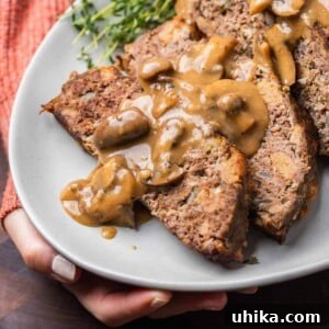 Meatloaf with mushroom brown gravy featured image.