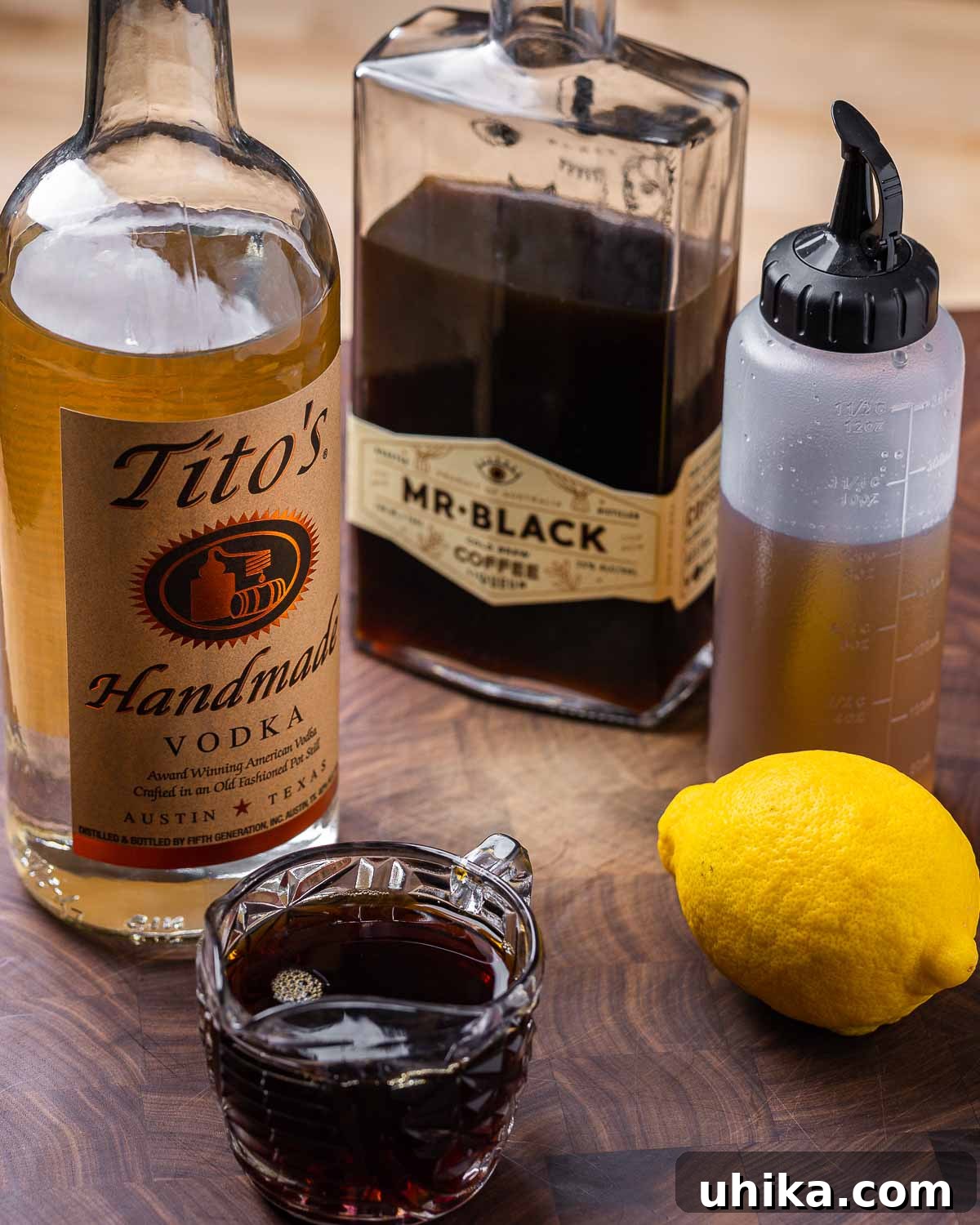 Velvet Nightcap 3 Ingredients for Espresso Martini: vodka, coffee liqueur, simple syrup, a lemon, and freshly brewed espresso.