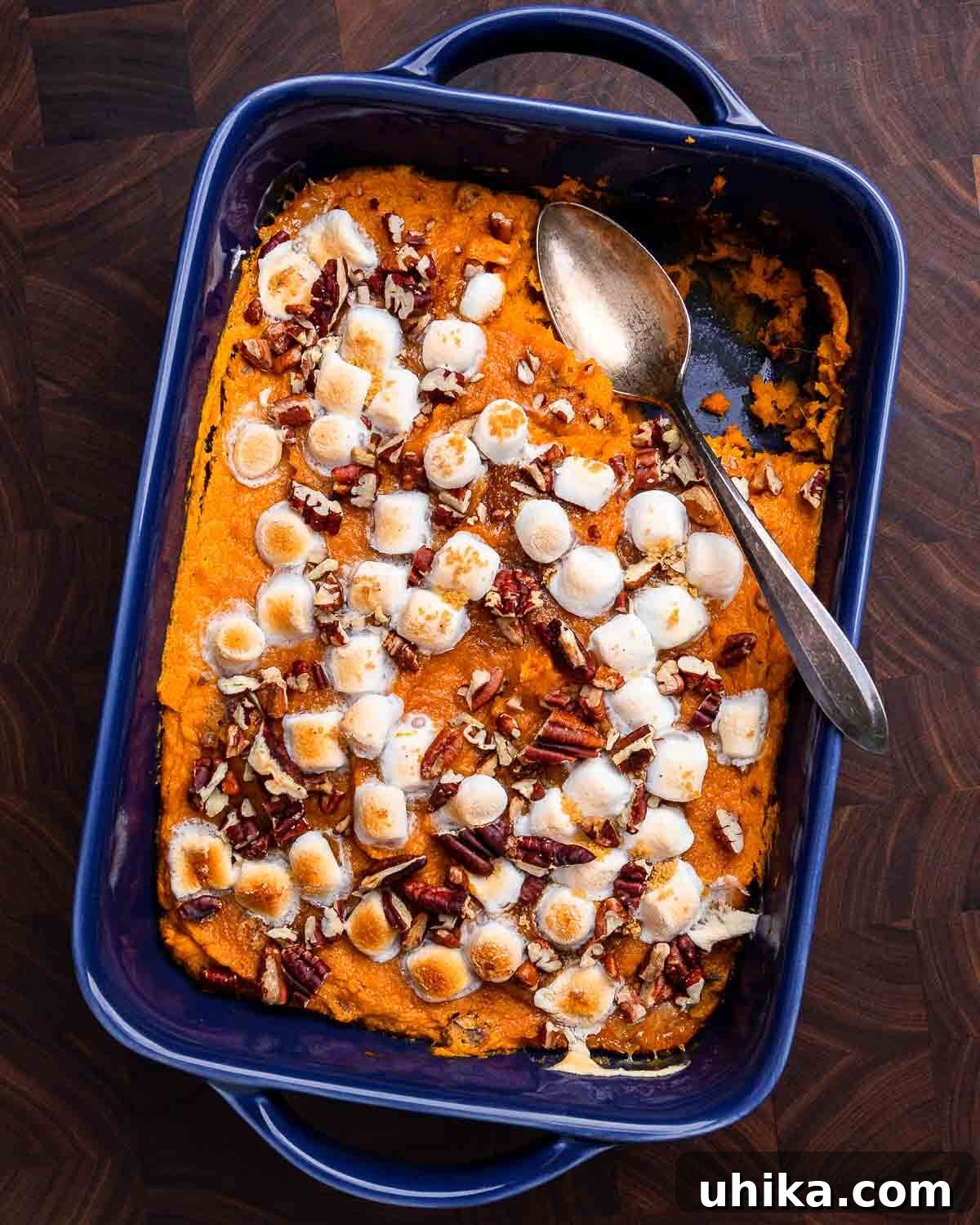Sweet Potato Cloud with Pecan Crunch 7 Overhead shot of sweet potato casserole in blue baking dish.