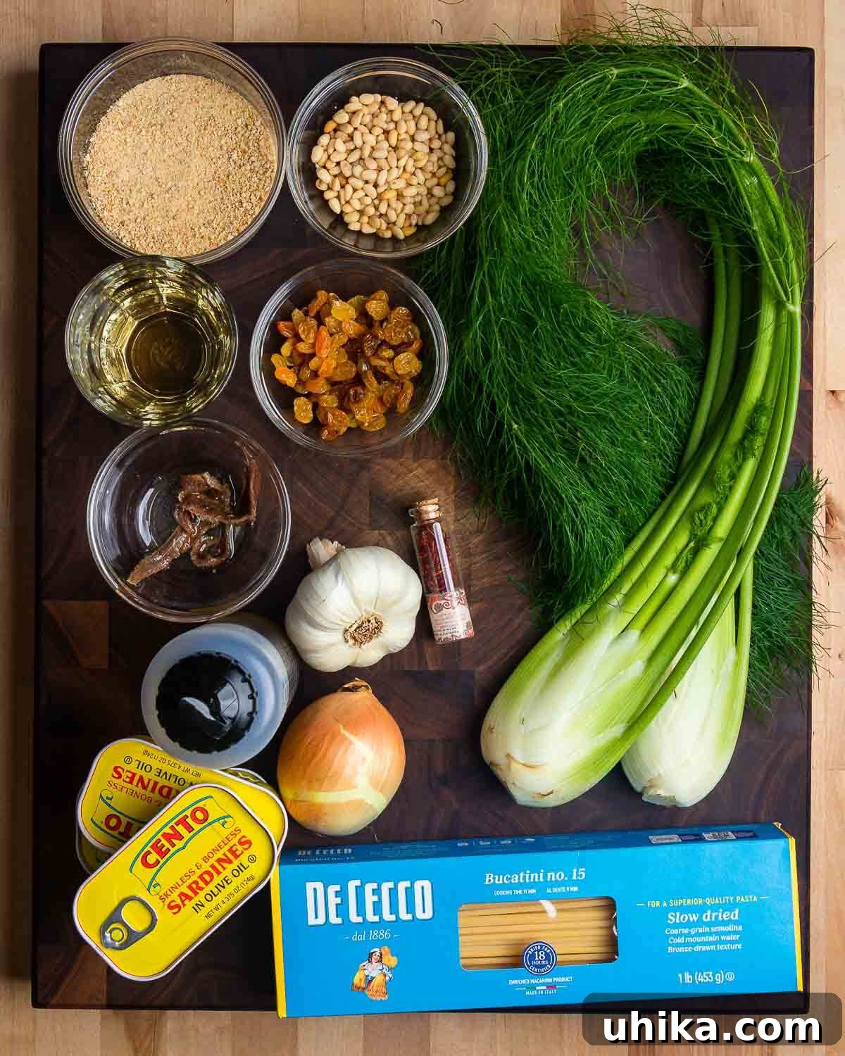 Sicilian Sardine Pasta 3 Overhead shot showcasing a vibrant array of fresh ingredients for Pasta con le Sarde recipe.