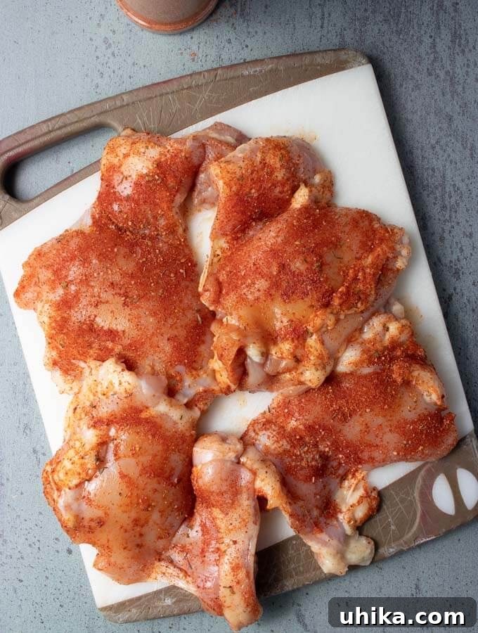 Spicy Cajun Chicken Sandwich 4 Raw chicken with the blackened spice applied.