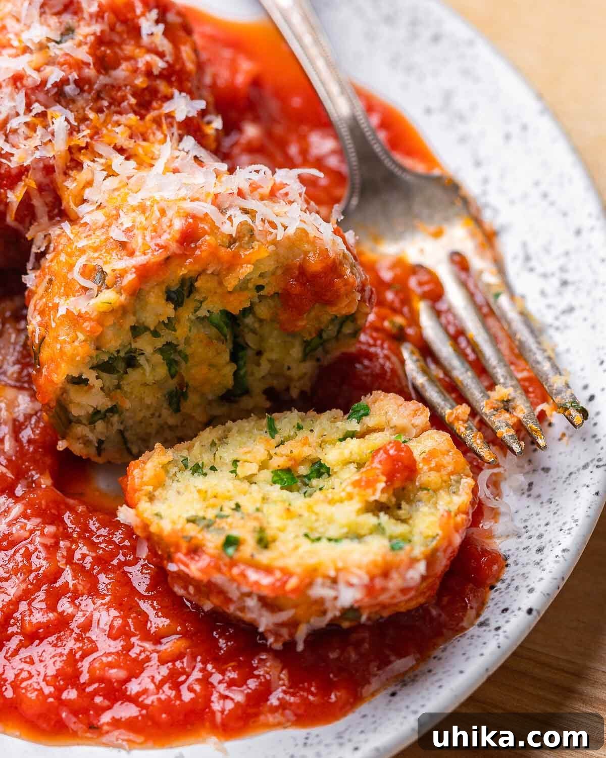 Golden Bread Fritters 8 White plate of cut open polpette di pane.