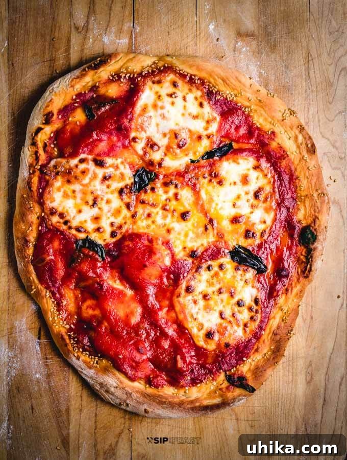 Baked Margherita Pizza Finished Margherita pizza with store bought pizza dough, perfectly baked and ready to serve.