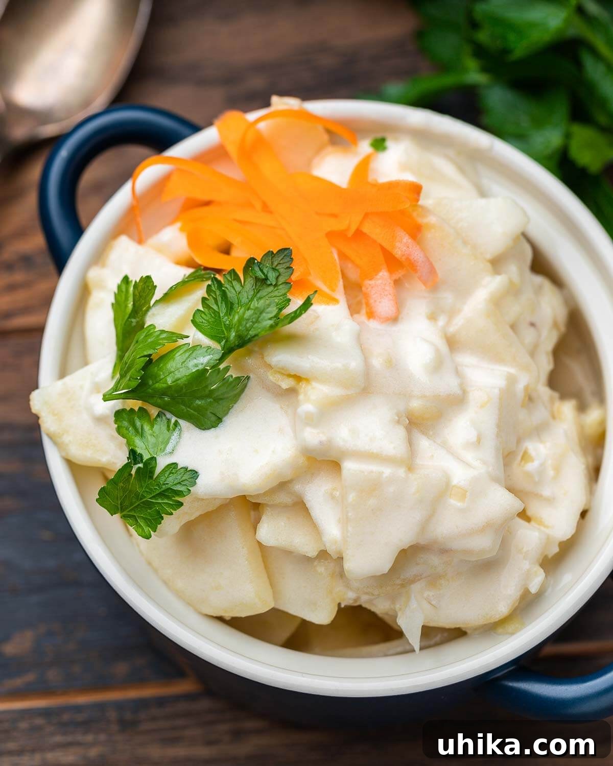 Iconic New York Deli Potato Salad 7 New York deli potato salad in blue dish.