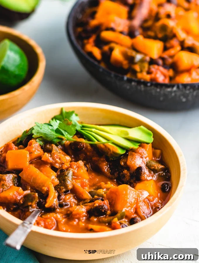 Roasted Poblano Peppers and Stewed Butternut Squash Chili - The Ultimate Fall Comfort Food Roasted poblano peppers and stewed butternut squash chili featured image.