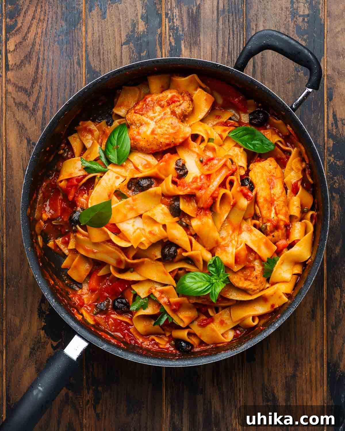 Rustic Chicken Cacciatore Pasta 9 Overhead shot of large pan with chicken cacciatore pasta.