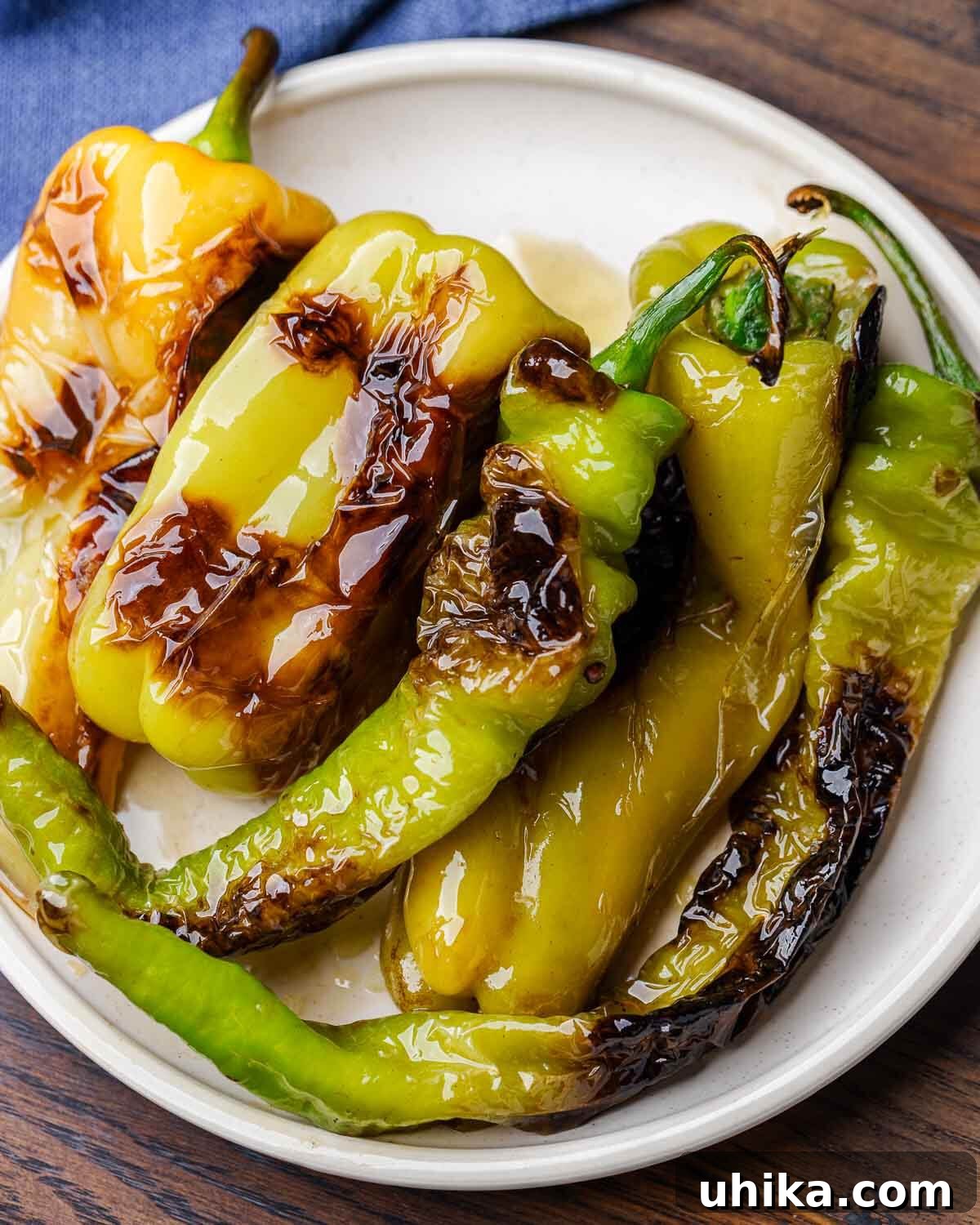 Classic Italian Sautéed Peppers 7 Assorted Italian fried peppers in a white plate, ready for serving.