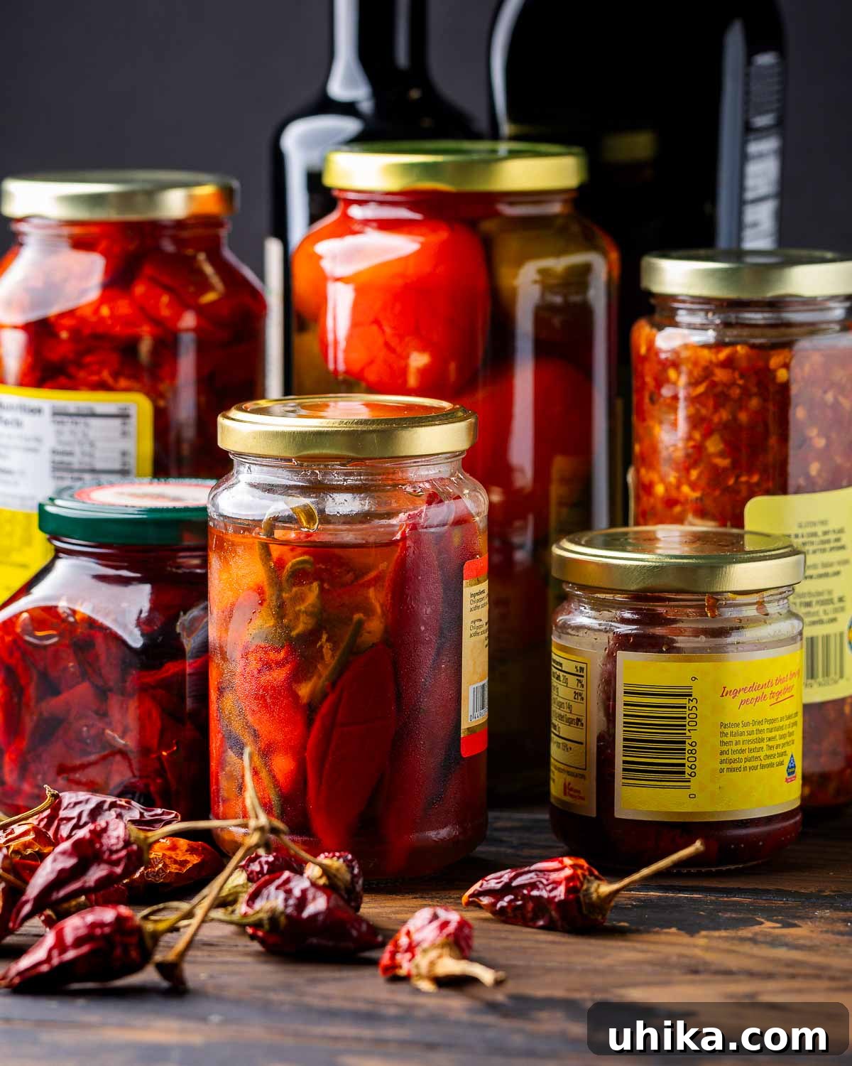 Feast Your Senses: Italy's Top Condiments Revealed 7 Closeup shot of various jars of Italian condiments.