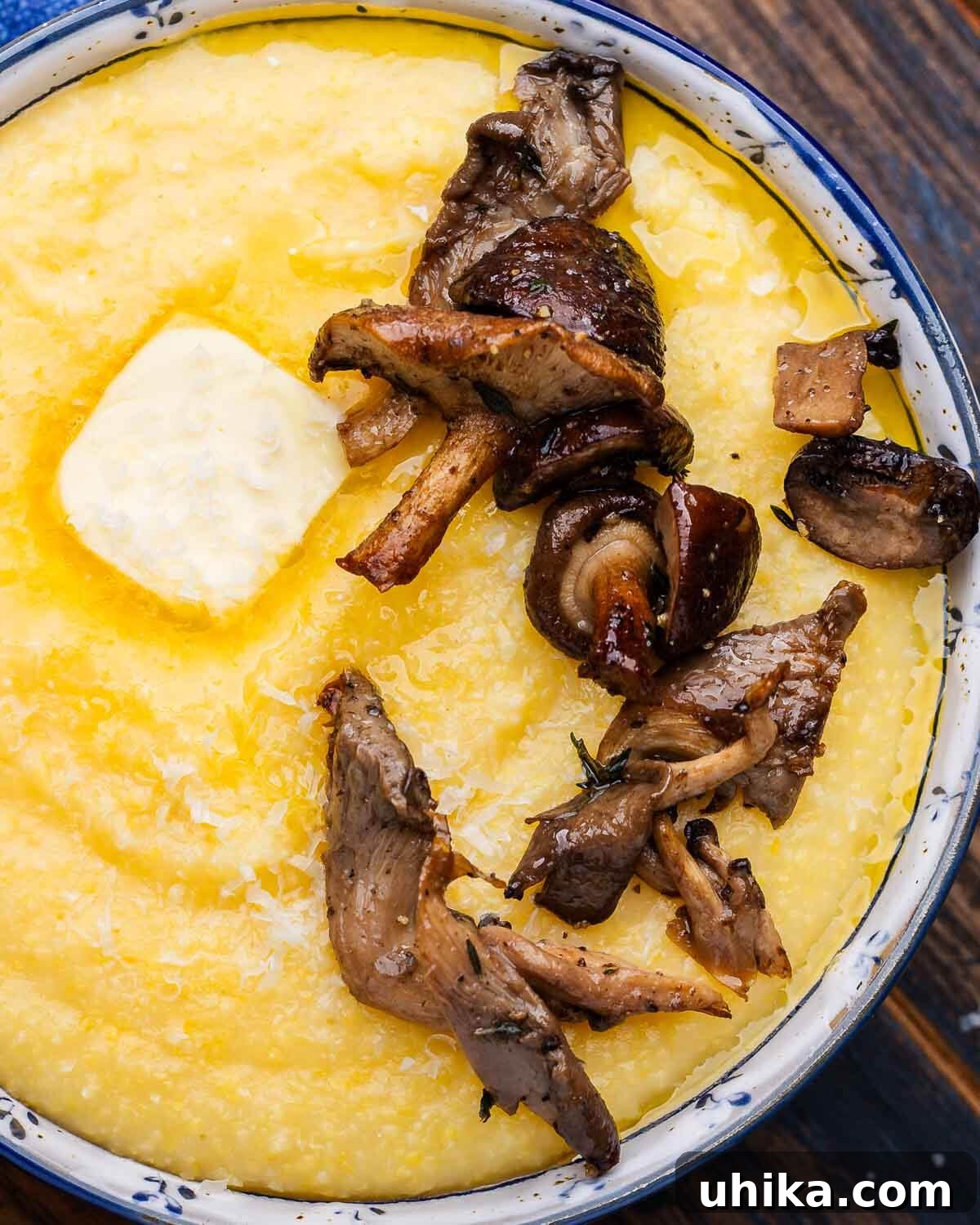 Golden Roasted Mushrooms 7 Roasted mushrooms atop bowl of polenta.