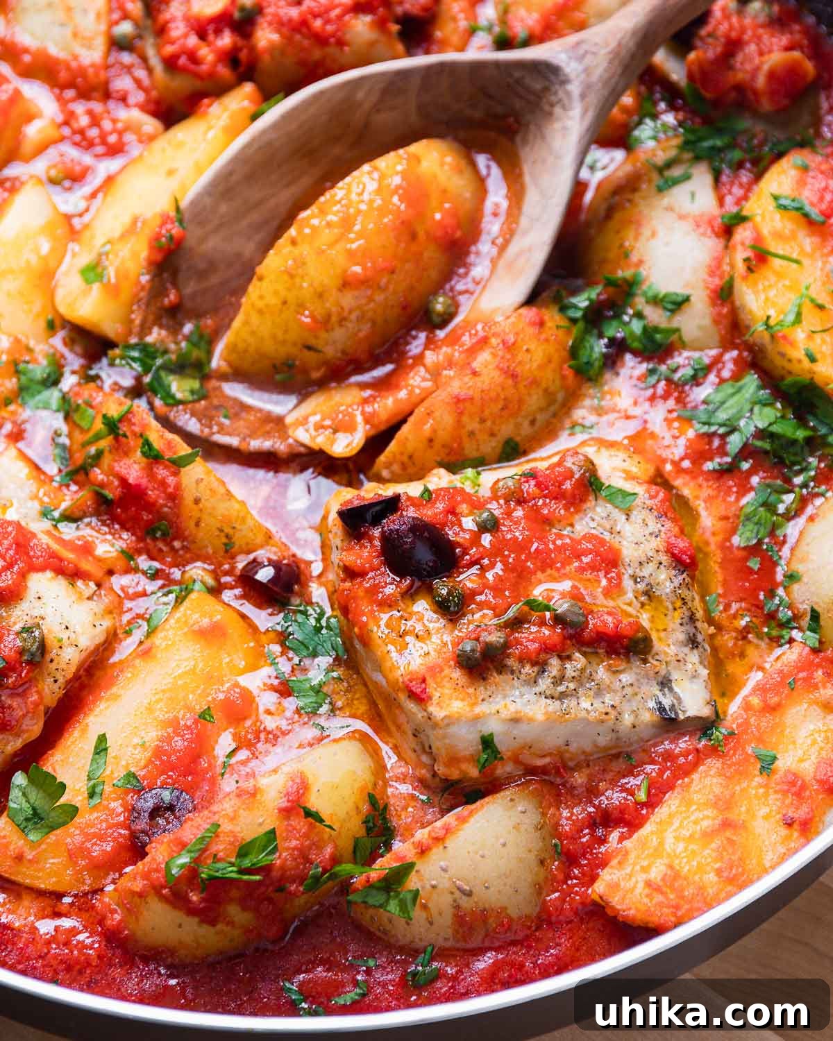 Crafting an Unforgettable Seven Fishes Feast 3 Large pan of cooked baccala alla Napoletana.
