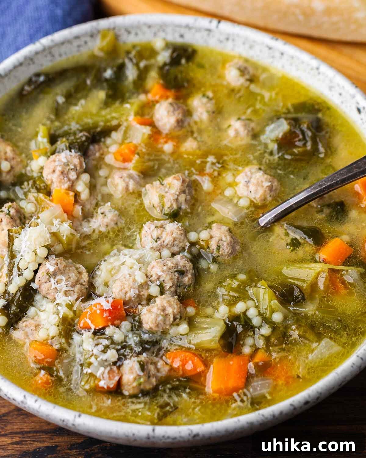 Italian Wedding Feast Soup 9 White bowl of Italian wedding soup.