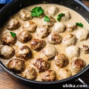Swedish meatballs in black pan for featured image.