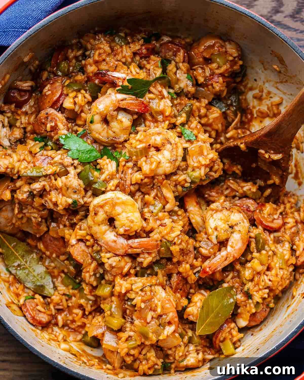 Creole Comfort 2 A large pot of steaming Jambalaya, generously topped with fresh, pink shrimp, ready to be served.