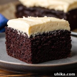 Slice of Chocolate Guinness Cake with Baileys Frosting as the main recipe image.