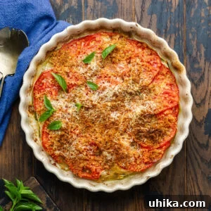 Italian zucchini casserole in baking dish on table.