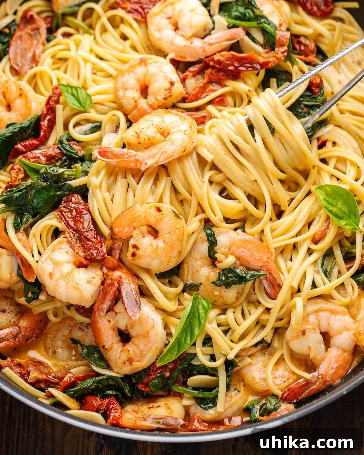 Sunset Shrimp Pasta 2 Creamy sun dried tomato shrimp pasta in large pan.