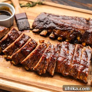 Rustic Tuscan Balsamic Glazed Ribs 7 Tuscan ribs with balsamic glaze on cutting board.