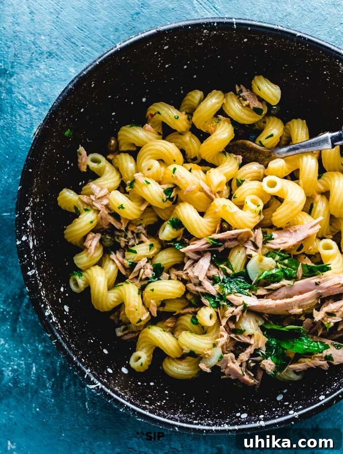 Delicious Tuna Pasta (Pasta al Tonno) served in a bowl, ready to eat.