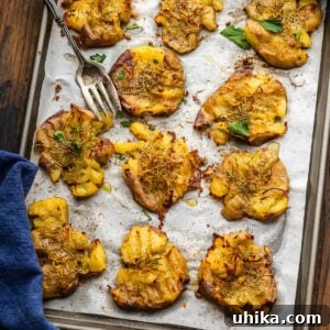 Crispy rosemary lemon smashed potatoes ready to serve.