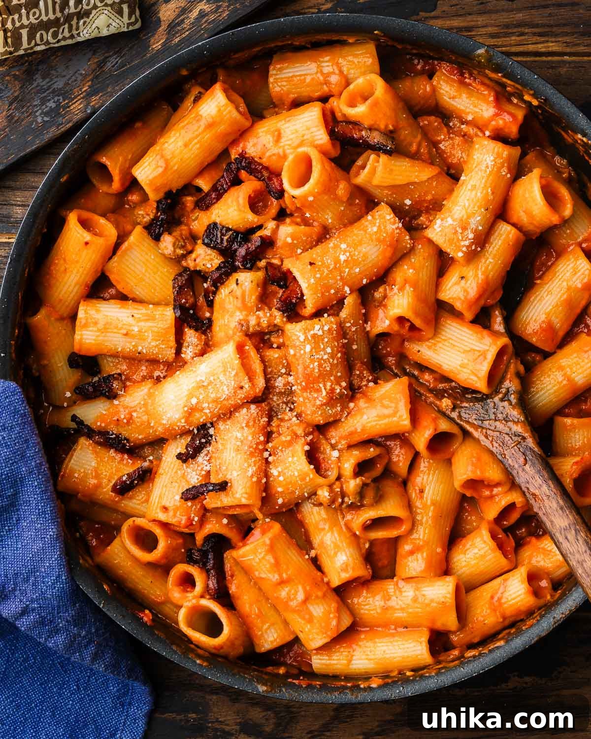 Roman Butcher's Pasta 2 Pasta alla Zozzona in large black pan with blue napkins.