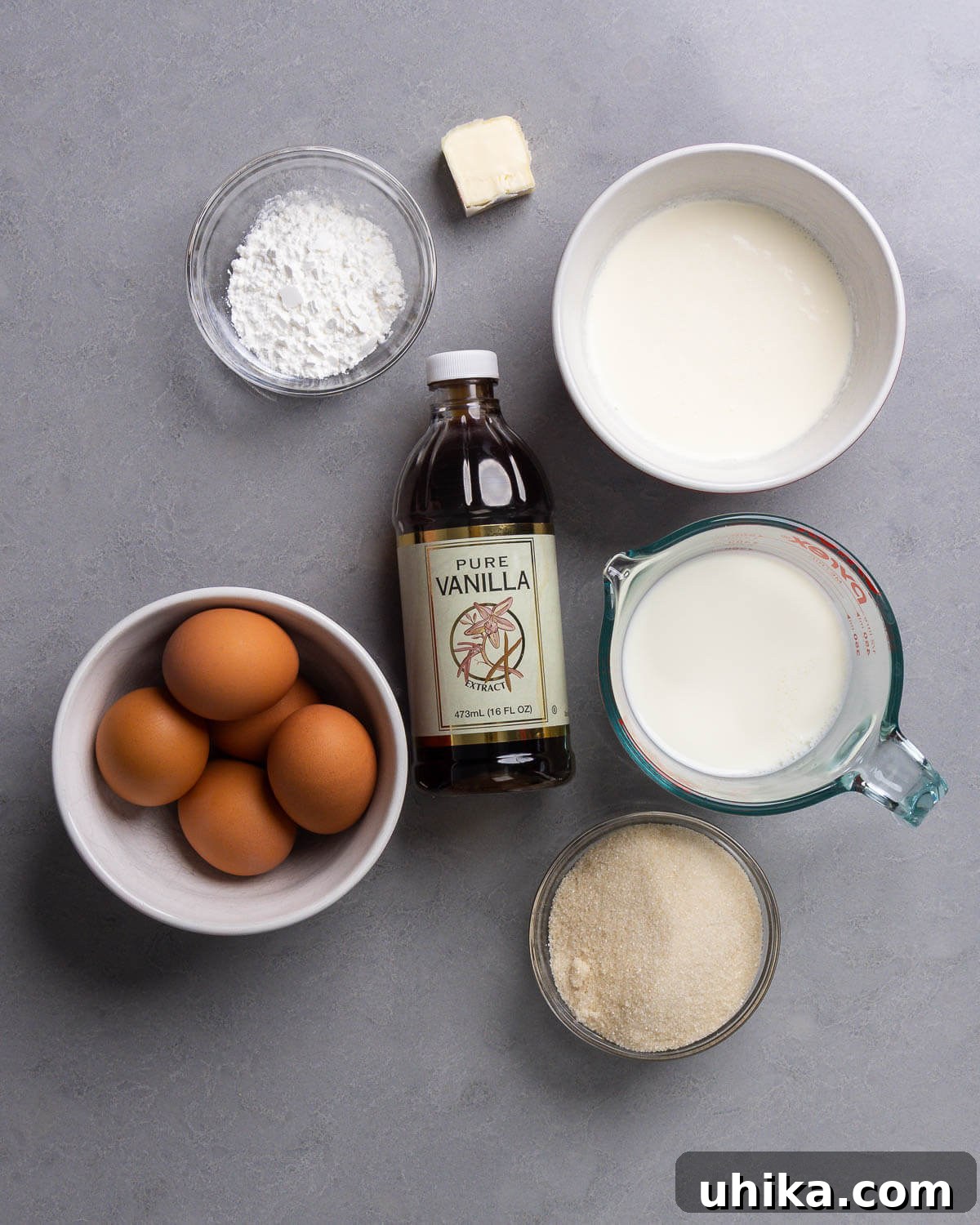 Golden Choux Perfection 5 Ingredients for pastry cream including cornstarch, butter, vanilla extract, milk, heavy cream, eggs, and sugar.