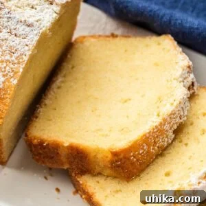 Slices of pound cake on white plate.