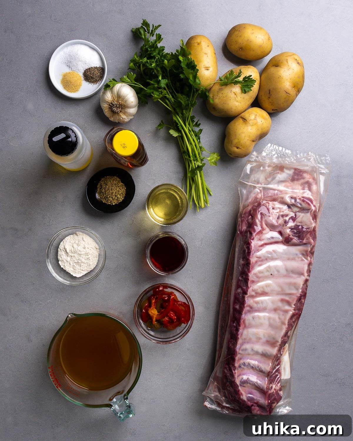 Sweet & Sticky Ribs with Golden Roasted Potatoes 4 Ingredients for sticky ribs and crispy potatoes: salt, pepper, granulated garlic, fresh garlic, olive oil, honey, oregano, parsley, Yukon Gold potatoes, white wine, red wine vinegar, flour, cherry peppers, baby back ribs, and chicken stock.