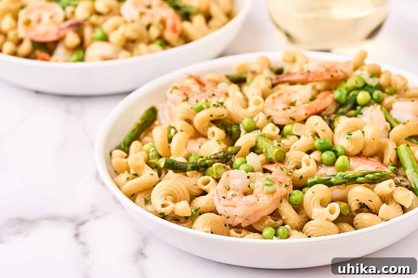 Vibrant Shrimp Primavera 4 Shrimp pasta primavera, perfectly plated in elegant pasta bowls, garnished and ready to be served for a delightful meal.