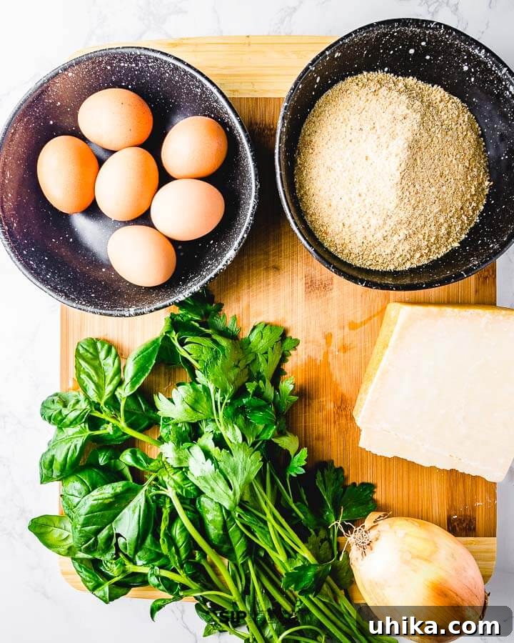 Ingredients shown: eggs, breadcrumbs, basil, parmesan cheese, and a large onion.