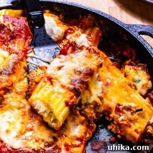Ultimate Four Cheese Baked Manicotti 2 Baked manicotti featured image.