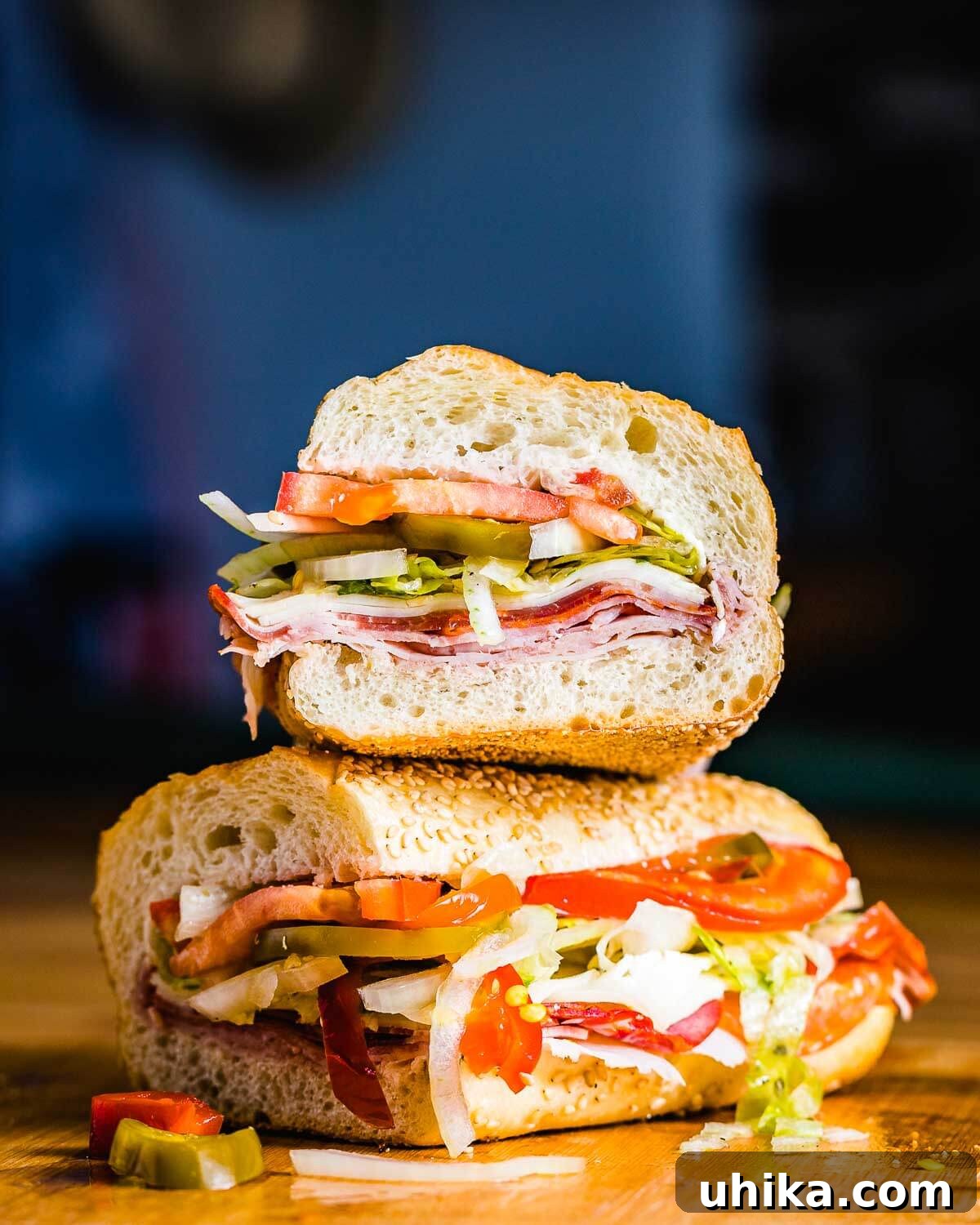 The hero sandwich cut in half and stacked on top of each other.