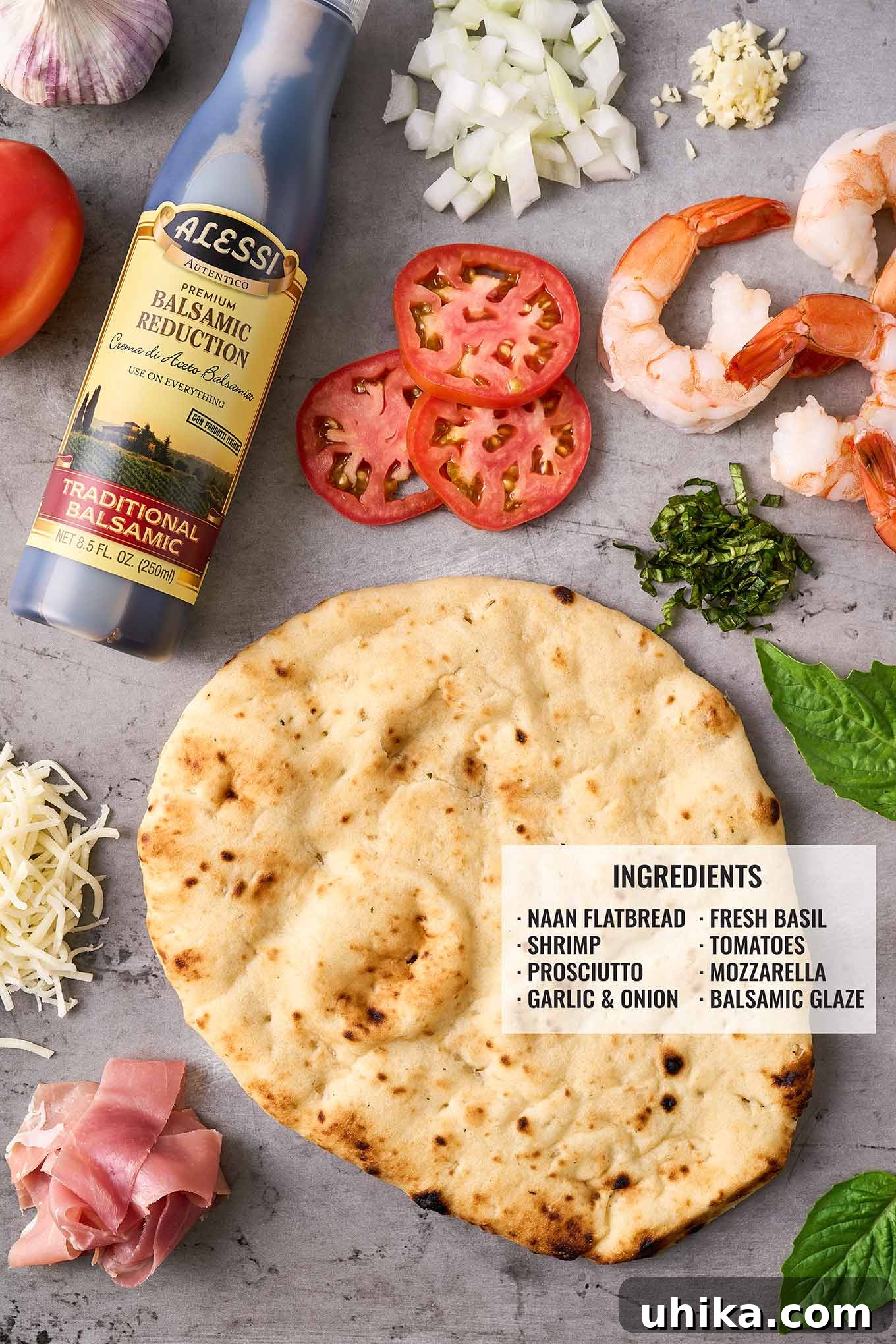 Prosciutto-Wrapped Shrimp Naan Pizza 3 Ingredients needed for naan pizzas with prosciutto-wrapped shrimp arranged on a gray background and labeled.