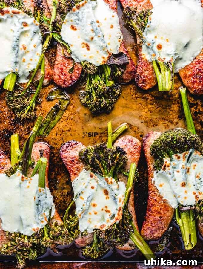 One-Pan Roasted Sausage & Broccolini 6 Melted fresh mozzarella gently bubbling over the roasted broccolini and Italian sausage on a sheet pan, having just come out of the broiler.