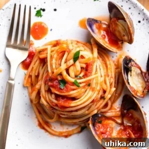 Clam Linguine Delight 9 Linguine with red clam sauce featured image.