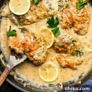 Zesty Lemon Pepper Chicken in Minutes 7 Lemon pepper chicken in black pan.