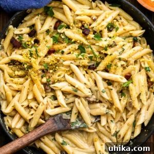 Pistachio Pesto Pasta with Lemon and Parmesan 7 Large black pan with pistachio pasta.